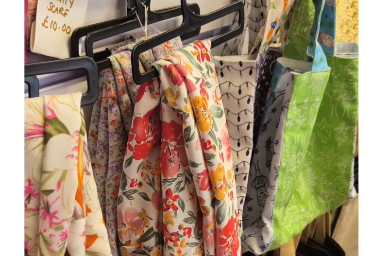 Photo of products by Karen. Photo of handmade bags and scarves by Karen.