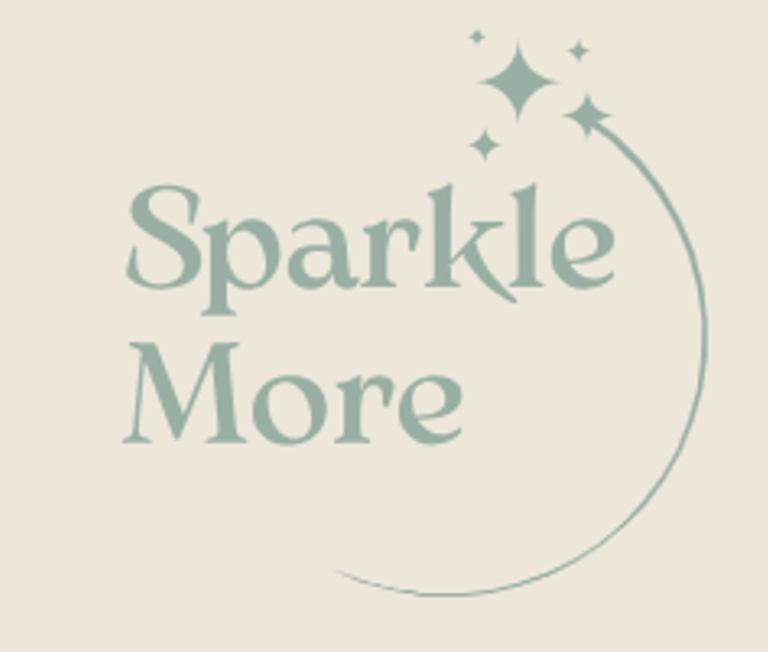 Sparkle More's logo. Sparkle More's logo, it has the words Sparkle More and a curved line ending with five sparkles in a sage green colour on a cream background.